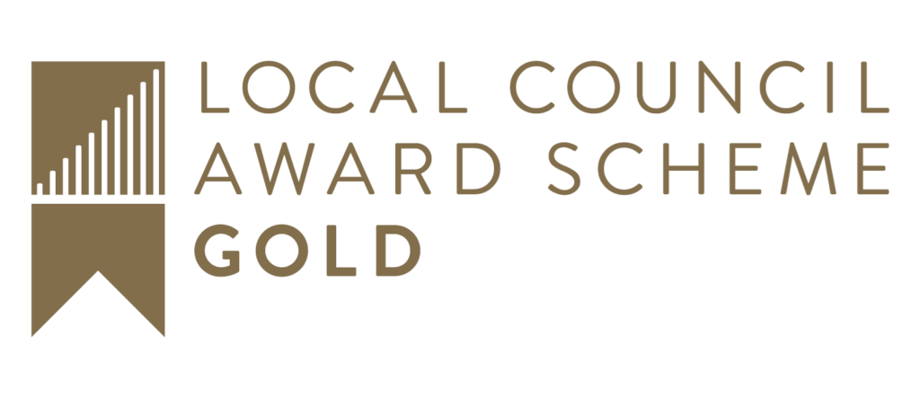 Picture of the local council gold award logo which Wootton achieved in 2025
