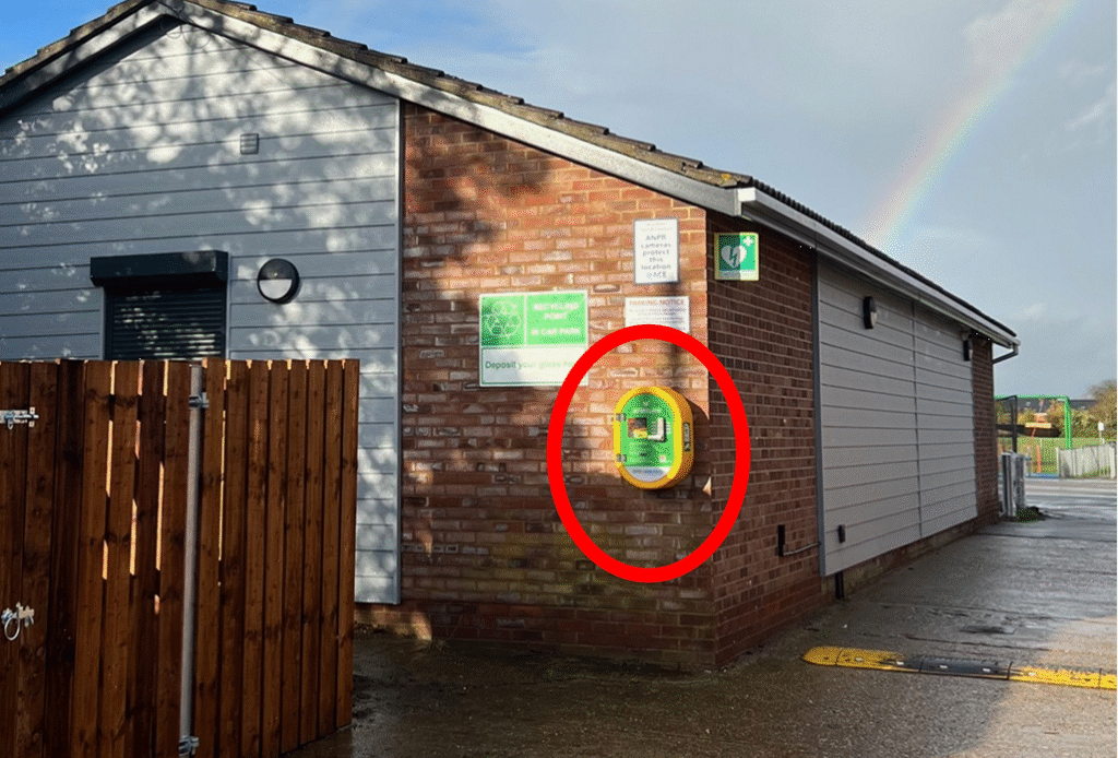 This picture shows the new location of the defibrilator on the changing rooms on Church Road.
